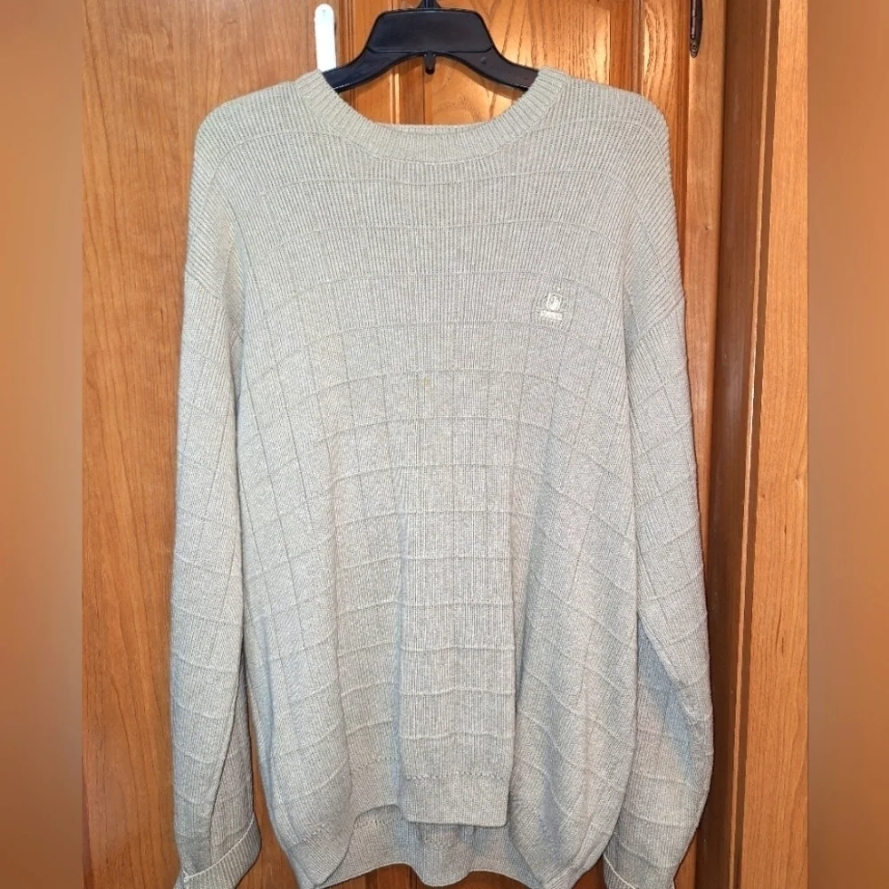 An Izod mens chunky sweater. It has a PTP 23.5